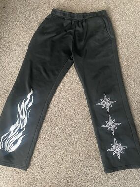 Black Graphic Jogger Pants with White Flame & Star Prints - Men